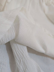 Textured White Peplum Button-Front Top