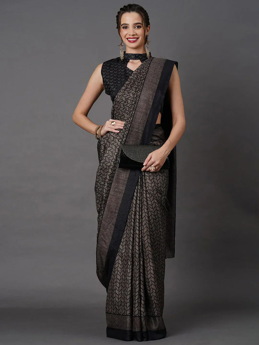 Black Printed Art Silk SareeSareeThis saree embodies festive elegance with its captivating geometric print, offering a modern twist on traditional attire. Perfect for celebratory occasions, the geomBlack Printed Art Silk Saree