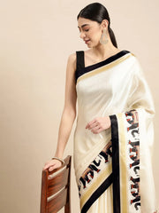 Ethnic Motifs Silk Blend SareeSareeThis festive saree boasts ethnic motifs, perfect for occasions steeped in cultural celebration. Its striped border adds a touch of traditional charm, enhancing its aEthnic Motifs Silk Blend Saree