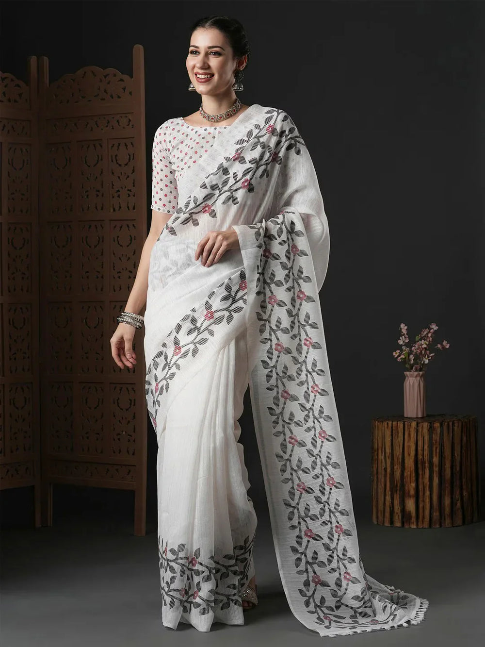 Floral Printed Block Print SareeSareeThis saree epitomizes timeless elegance with its traditional block print design, featuring delicate floral patterns that add a charming touch to its overall aesthetiFloral Printed Block Print Saree