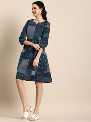 Geometric Printed A-Line Cotton Cambric DressEthnic DressesThis knee-length dress is crafted from woven cotton fabric, featuring a flared hemline and an A-line shape. Its round neck and three-quarter sleeves offer a classic -Line Cotton Cambric Dress