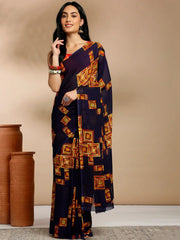Navy Blue Geometric Printed Pure Georgette SareeSareeThis saree features a geometric print pattern, making it suitable for daily wear with its versatile and contemporary design. The absence of a border gives it a cleanNavy Blue Geometric Printed Pure Georgette Saree