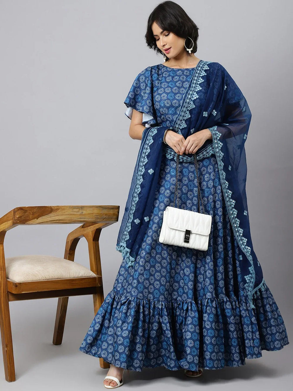 Printed Ikat Ready to Wear Lehenga & Blouse With DupattaLehenga CholisThis exquisite lehenga ensemble features a blend of cotton fabrics, ensuring both comfort and elegance. The lehenga and blouse are crafted from cotton, offering a soPrinted Ikat Ready