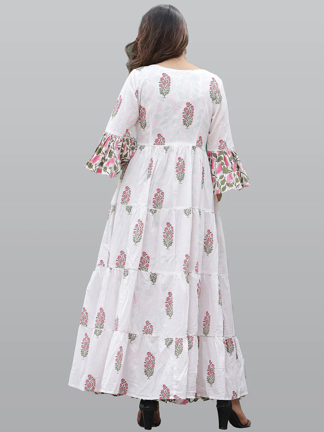 Women White & Pink Floral Printed Flared Sleeves Floral Anarkali KurtaEthnic DressesThis exquisite Anarkali dress boasts long sleeves and a flattering round neck, offering a timeless silhouette that's perfect for daily wear. Adorned with a charming Women White & Pink Floral Printed Flared Sleeves Floral Anarkali Kurta