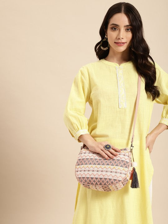 Textured Self Design Half Moon Sling Bag with Tasselled Detail-1