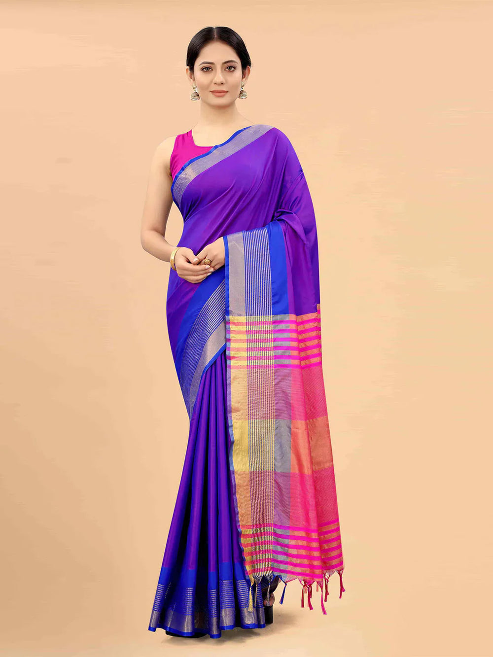 Purple & Pink Zari Art Silk Fusion Arani SareeSareeThe Arani saree exudes timeless elegance with its solid hue, making it perfect for traditional occasions. Ornamented with intricate Zari work along the borders, it ePurple & Pink Zari Art Silk Fusion Arani Saree