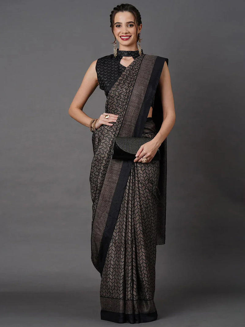 Black Printed Art Silk SareeSareeThis saree embodies festive elegance with its captivating geometric print, offering a modern twist on traditional attire. Perfect for celebratory occasions, the geomBlack Printed Art Silk Saree