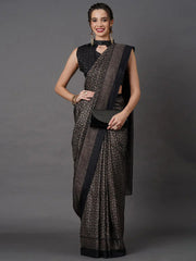 Black Printed Art Silk SareeSareeThis saree embodies festive elegance with its captivating geometric print, offering a modern twist on traditional attire. Perfect for celebratory occasions, the geomBlack Printed Art Silk Saree