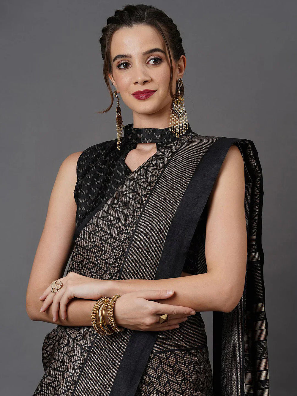 Black Printed Art Silk SareeSareeThis saree embodies festive elegance with its captivating geometric print, offering a modern twist on traditional attire. Perfect for celebratory occasions, the geomBlack Printed Art Silk Saree