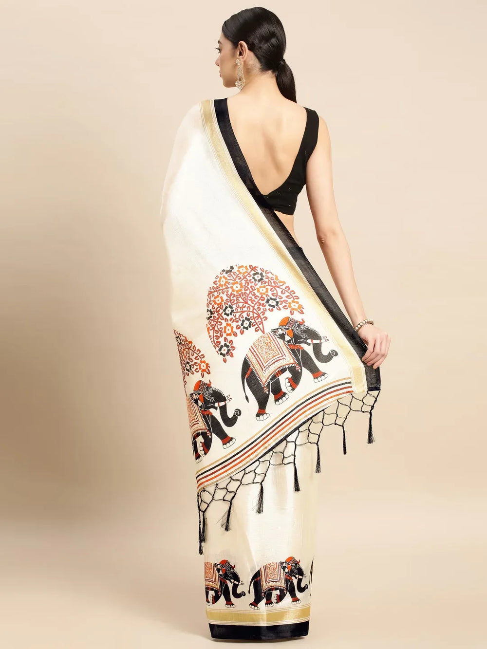 Ethnic Motifs Silk Blend SareeSareeThis festive saree boasts ethnic motifs, perfect for occasions steeped in cultural celebration. Its striped border adds a touch of traditional charm, enhancing its aEthnic Motifs Silk Blend Saree