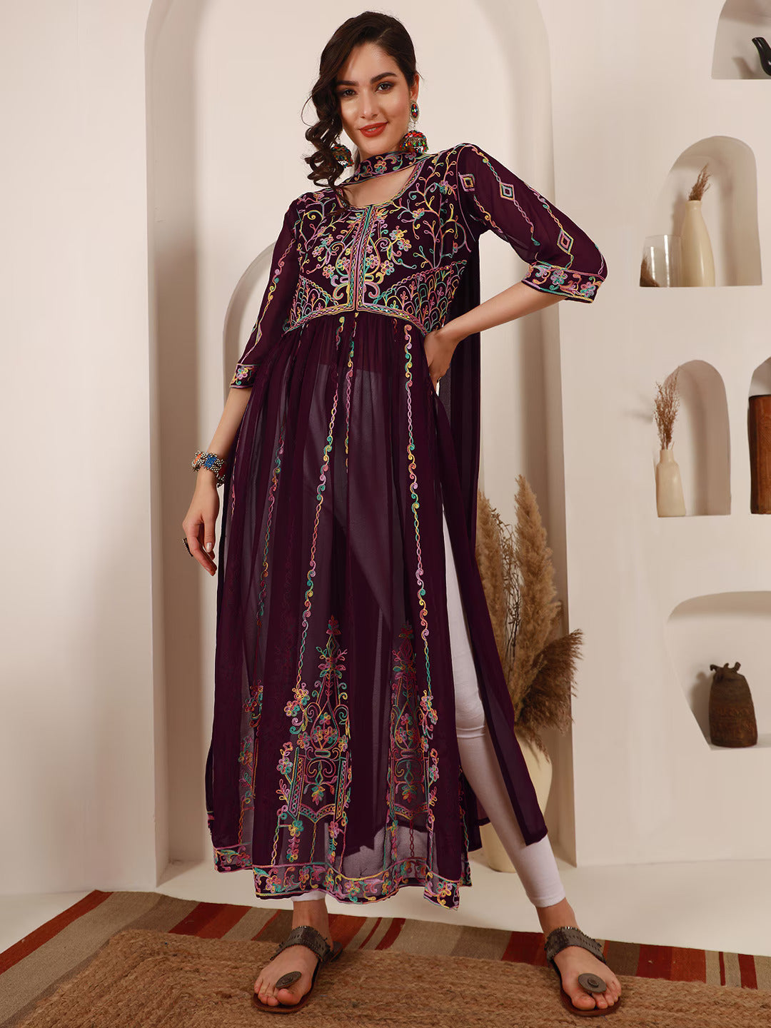 Ethnic Motifs Embroidered A-Line Kurta With DupattaKurta SetsThis elegant dress features three-quarter sleeves and an A-line shape, offering a flattering and comfortable fit. The round neck adds a classic touch to the design, Ethnic Motifs Embroidered