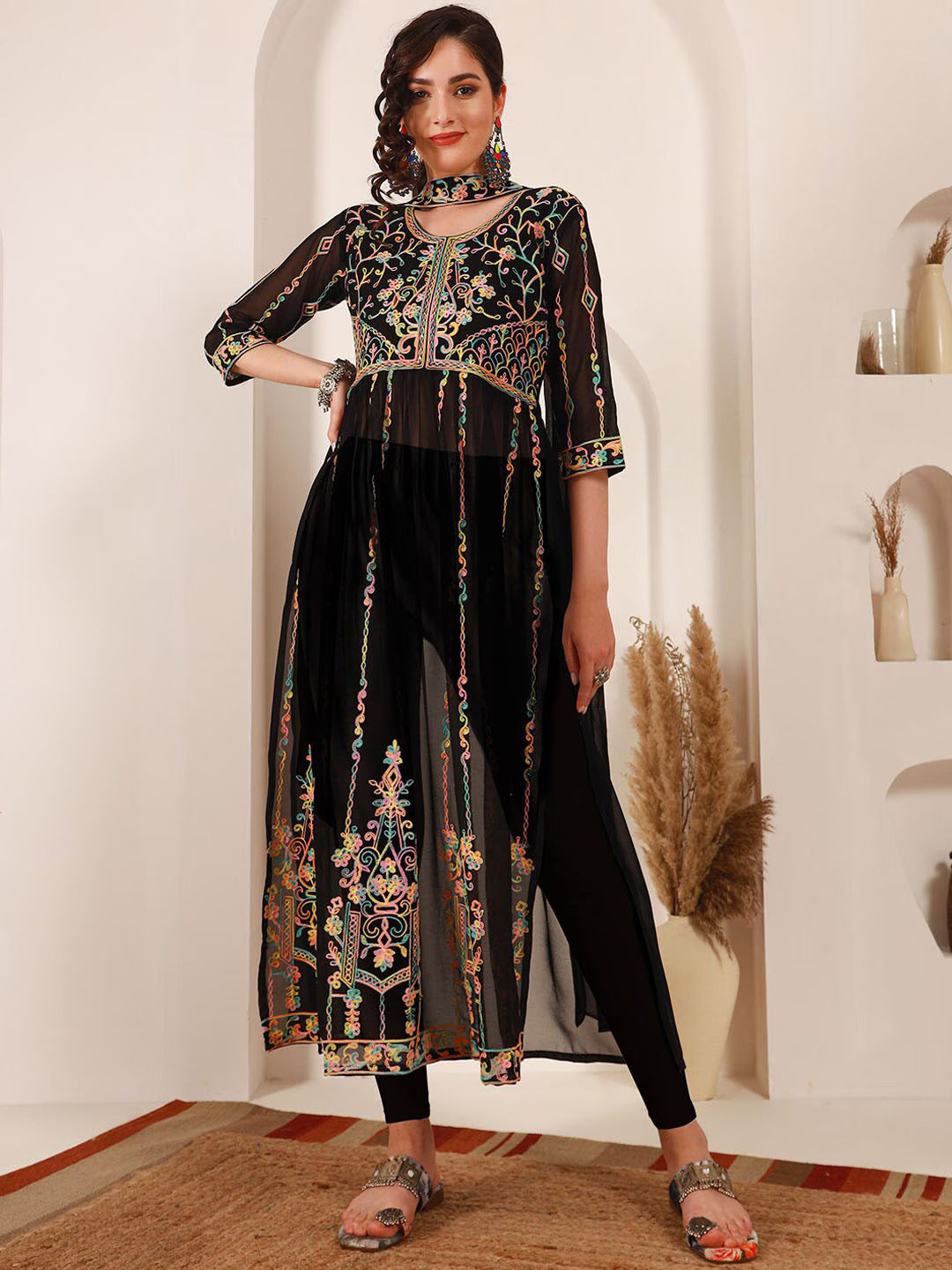 Ethnic Motifs Embroidered A-Line Kurta With DupattaKurta SetsThis elegant dress features three-quarter sleeves and an A-line shape, offering a flattering and comfortable fit. The round neck adds a classic touch to the design, Ethnic Motifs Embroidered