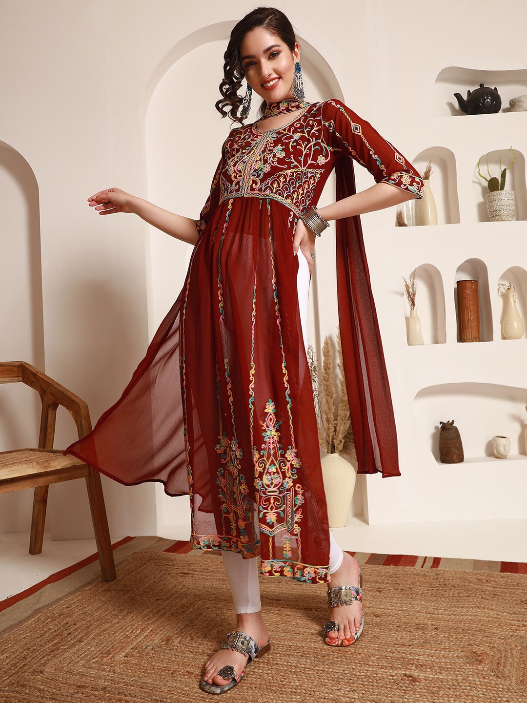 Ethnic Motifs Embroidered A-Line Kurta With DupattaKurta SetsThis elegant dress features three-quarter sleeves and an A-line shape, offering a flattering and comfortable fit. The round neck adds a classic touch to the design, Ethnic Motifs Embroidered