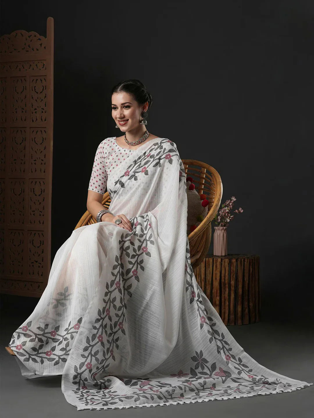 Floral Printed Block Print SareeSareeThis saree epitomizes timeless elegance with its traditional block print design, featuring delicate floral patterns that add a charming touch to its overall aesthetiFloral Printed Block Print Saree