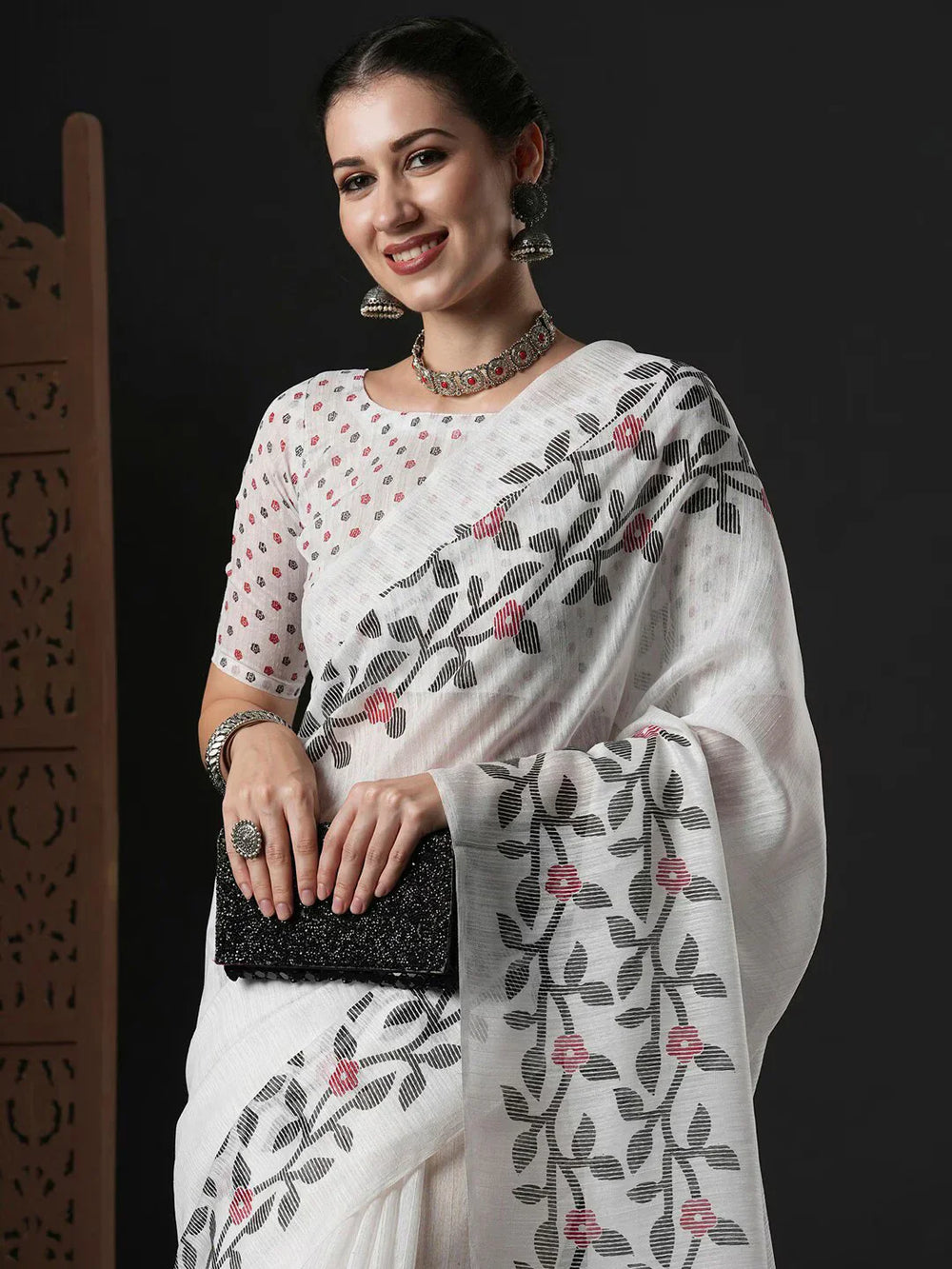 Floral Printed Block Print SareeSareeThis saree epitomizes timeless elegance with its traditional block print design, featuring delicate floral patterns that add a charming touch to its overall aesthetiFloral Printed Block Print Saree