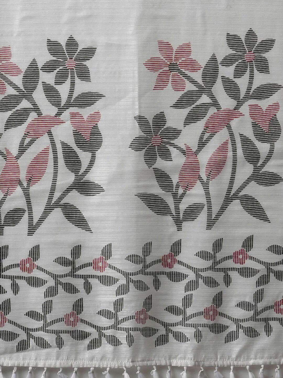 Floral Printed Block Print SareeSareeThis saree epitomizes timeless elegance with its traditional block print design, featuring delicate floral patterns that add a charming touch to its overall aesthetiFloral Printed Block Print Saree