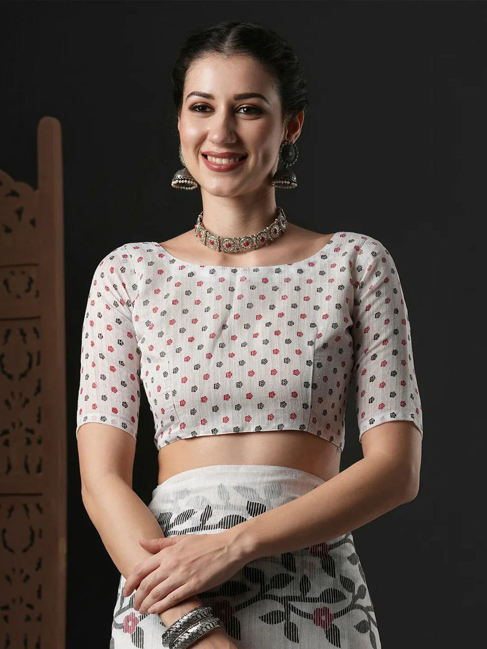 Floral Printed Block Print SareeSareeThis saree epitomizes timeless elegance with its traditional block print design, featuring delicate floral patterns that add a charming touch to its overall aesthetiFloral Printed Block Print Saree