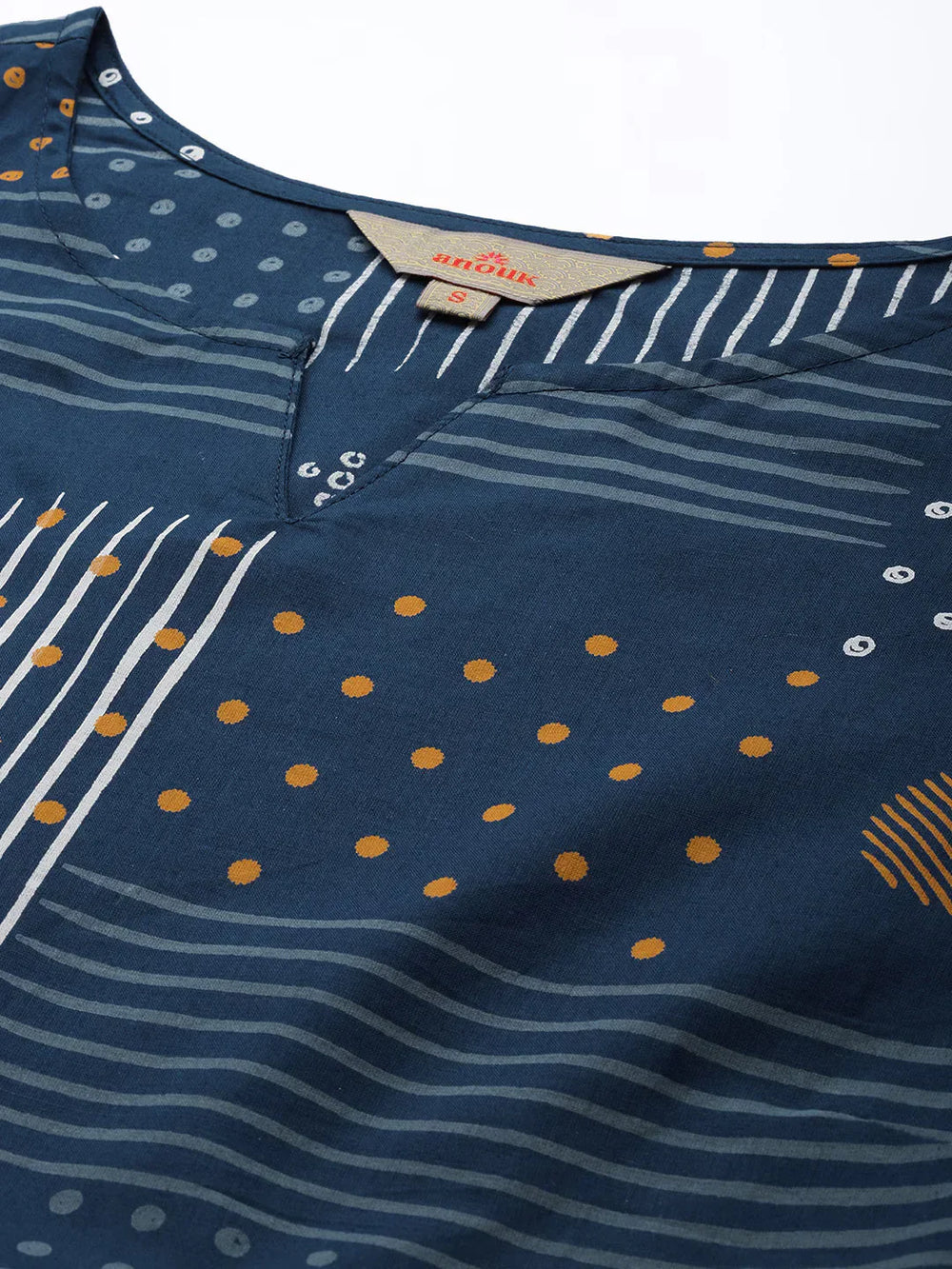 Geometric Printed A-Line Cotton Cambric DressEthnic DressesThis knee-length dress is crafted from woven cotton fabric, featuring a flared hemline and an A-line shape. Its round neck and three-quarter sleeves offer a classic -Line Cotton Cambric Dress