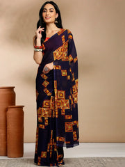 Navy Blue Geometric Printed Pure Georgette SareeSareeThis saree features a geometric print pattern, making it suitable for daily wear with its versatile and contemporary design. The absence of a border gives it a cleanNavy Blue Geometric Printed Pure Georgette Saree
