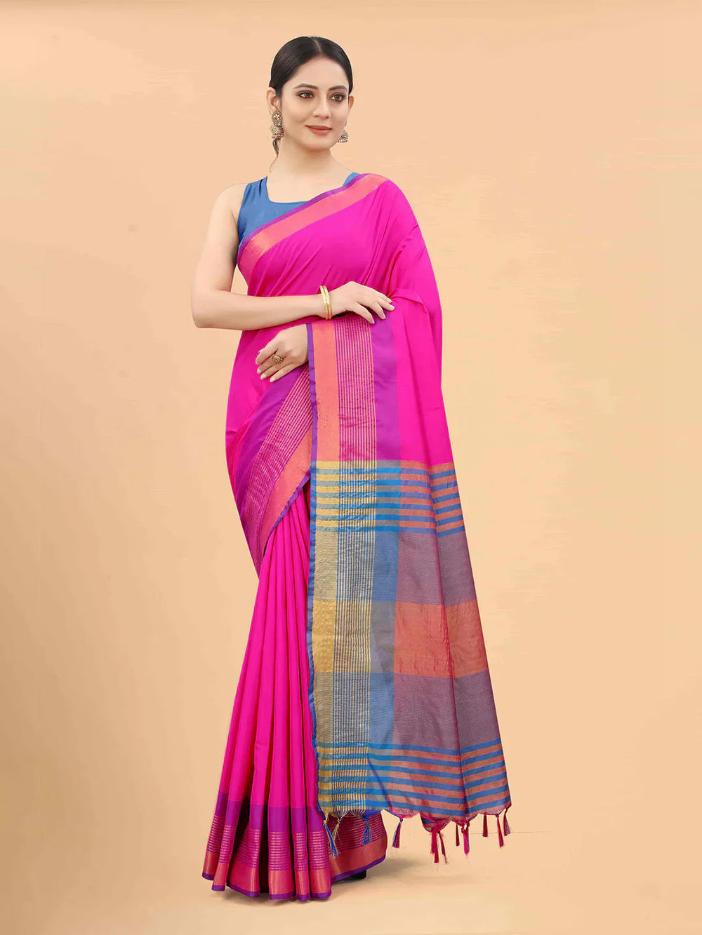 Purple & Pink Zari Art Silk Fusion Arani SareeSareeThe Arani saree exudes timeless elegance with its solid hue, making it perfect for traditional occasions. Ornamented with intricate Zari work along the borders, it ePurple & Pink Zari Art Silk Fusion Arani Saree