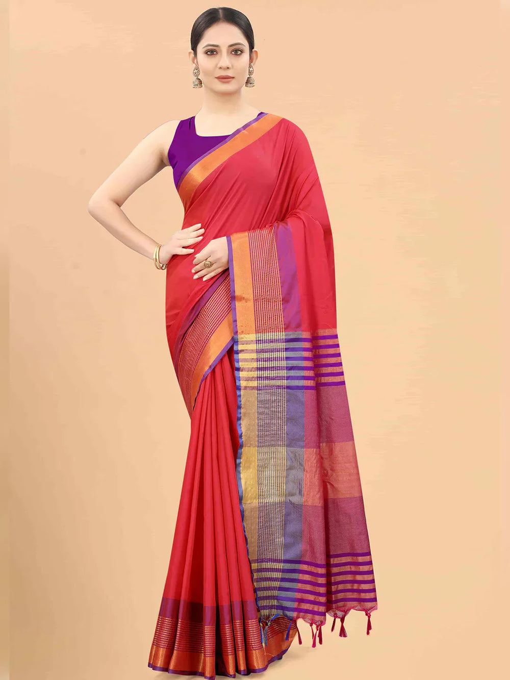 Purple & Pink Zari Art Silk Fusion Arani SareeSareeThe Arani saree exudes timeless elegance with its solid hue, making it perfect for traditional occasions. Ornamented with intricate Zari work along the borders, it ePurple & Pink Zari Art Silk Fusion Arani Saree