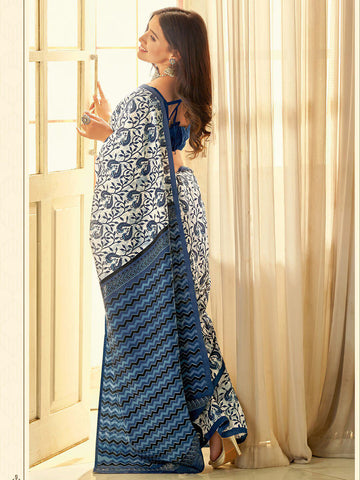 Ethnic Motifs Printed SareeSareeThis stunning saree features intricate ethnic motifs, making it an ideal choice for festive occasions where cultural traditions are celebrated. Its solid border addsEthnic Motifs Printed Saree