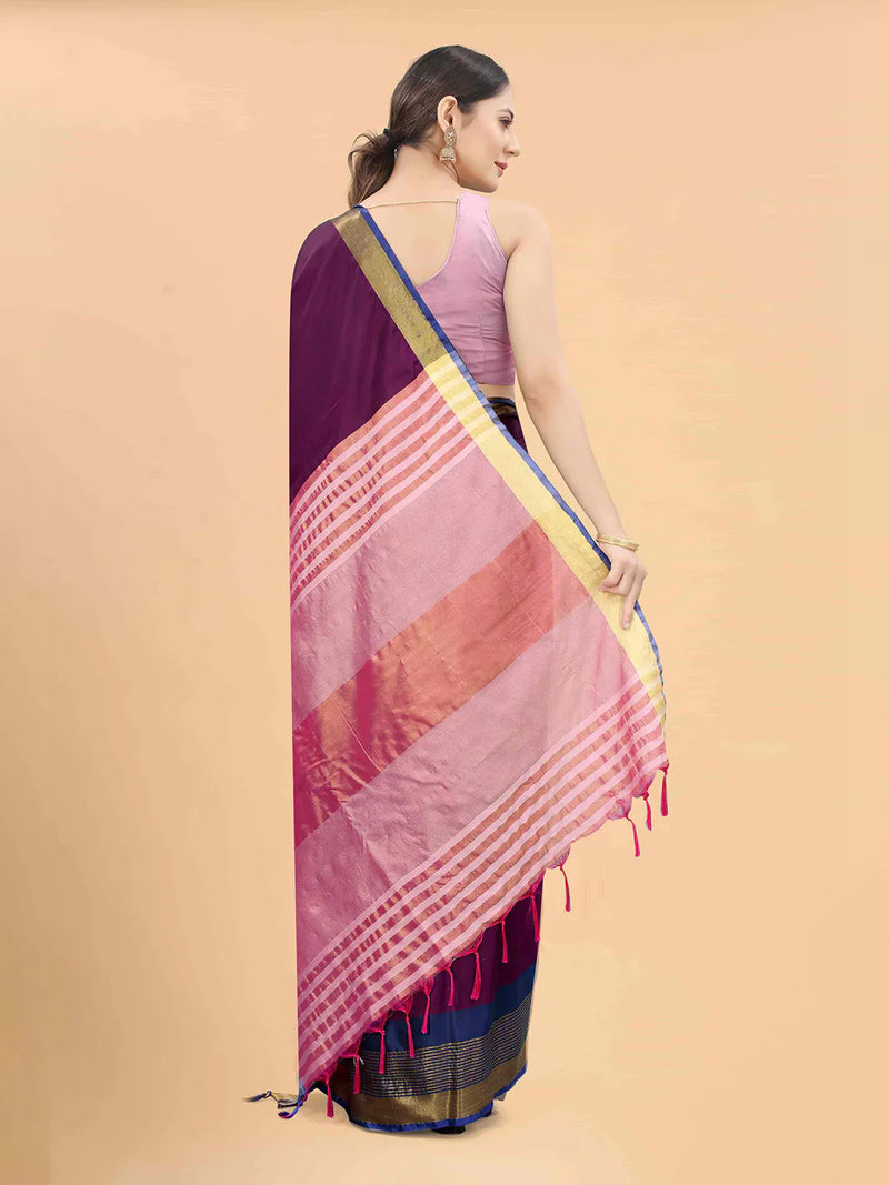 Purple & Pink Zari Art Silk Fusion Arani SareeSareeThe Arani saree exudes timeless elegance with its solid hue, making it perfect for traditional occasions. Ornamented with intricate Zari work along the borders, it ePurple & Pink Zari Art Silk Fusion Arani Saree