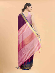 Purple & Pink Zari Art Silk Fusion Arani SareeSareeThe Arani saree exudes timeless elegance with its solid hue, making it perfect for traditional occasions. Ornamented with intricate Zari work along the borders, it ePurple & Pink Zari Art Silk Fusion Arani Saree